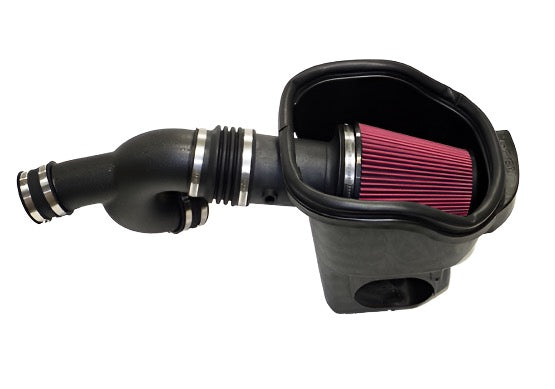 Close-up of a high-performance cold air intake system featuring a pink air filter and black tubing, specifically designed for the F-150 EcoBoost.